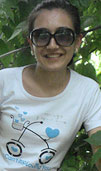 Dinara is a kirgisian woman